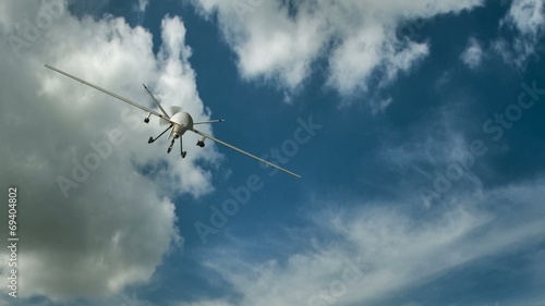 an armed predator drone in flight on the camera