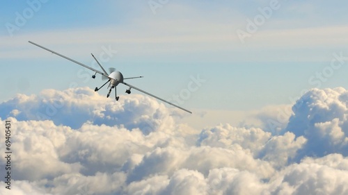an armed predator drone in flight on the camera photo