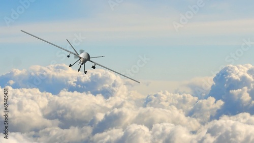 an armed predator drone in flight on the camera