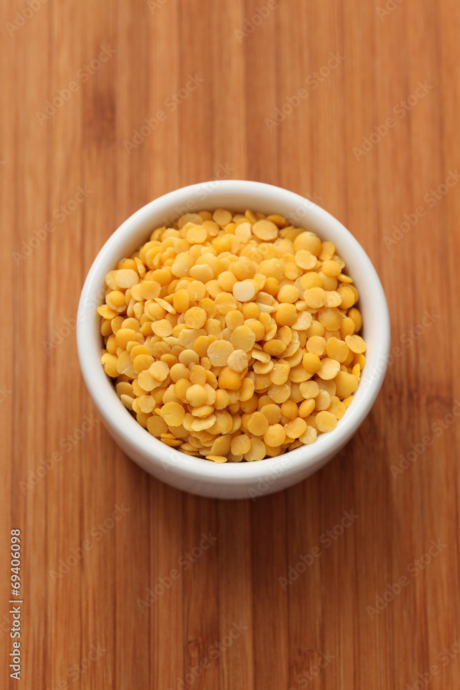 Yellow split lentils in a bowl Yellow split lentils in a bowl