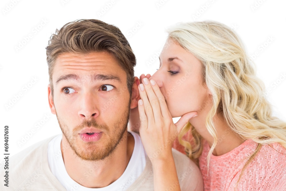 Attractive blonde whispering secret to boyfriend Attractive blonde whispering secret to boyfriend