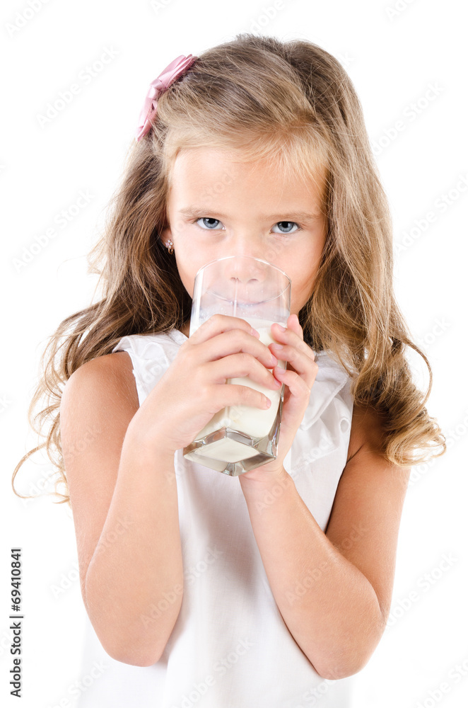 Smiling little girl drinking milk isolated Smiling little girl drinking milk isolated