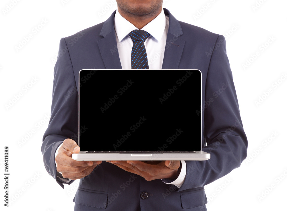 Business man holding a laptop, isolated on white background Business man holding a laptop, isolated on white background