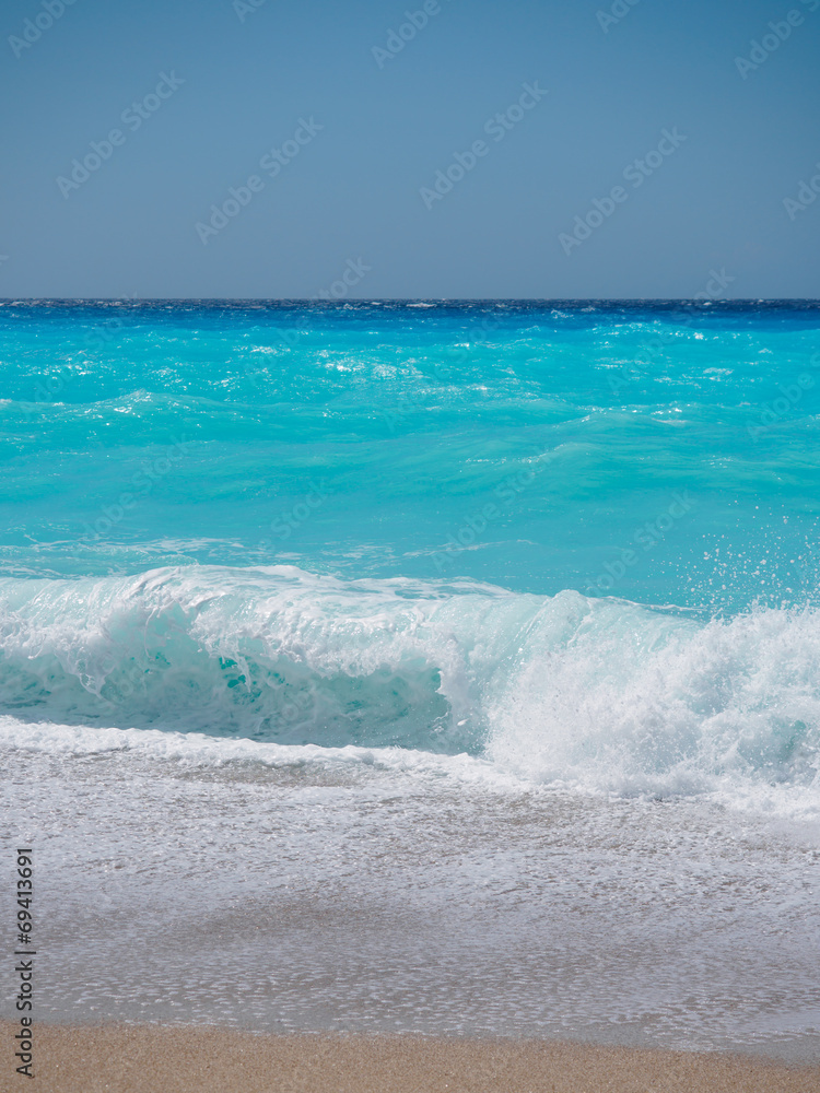 wild beach with rocks in water. Island Lefkada, Greece