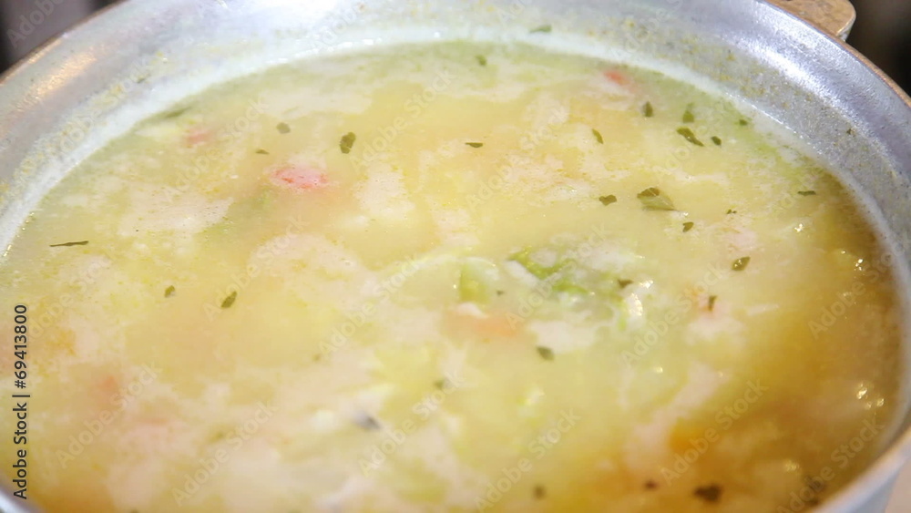 Closeup of hot vegetable soup with vapor Closeup of hot vegetable soup with vapor