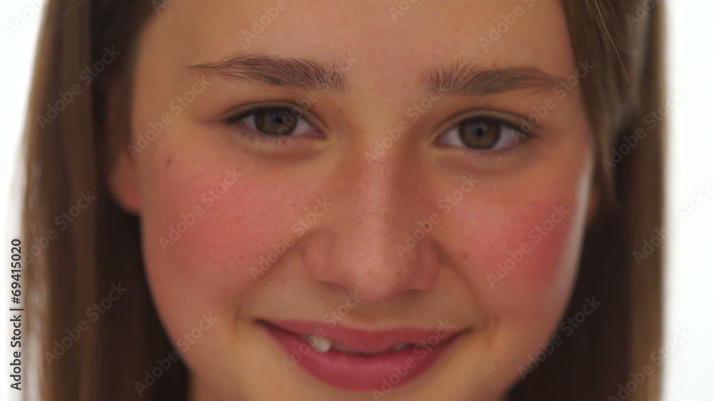 Closeup face portrait of a pretty young girl Closeup face portrait of a pretty young girl