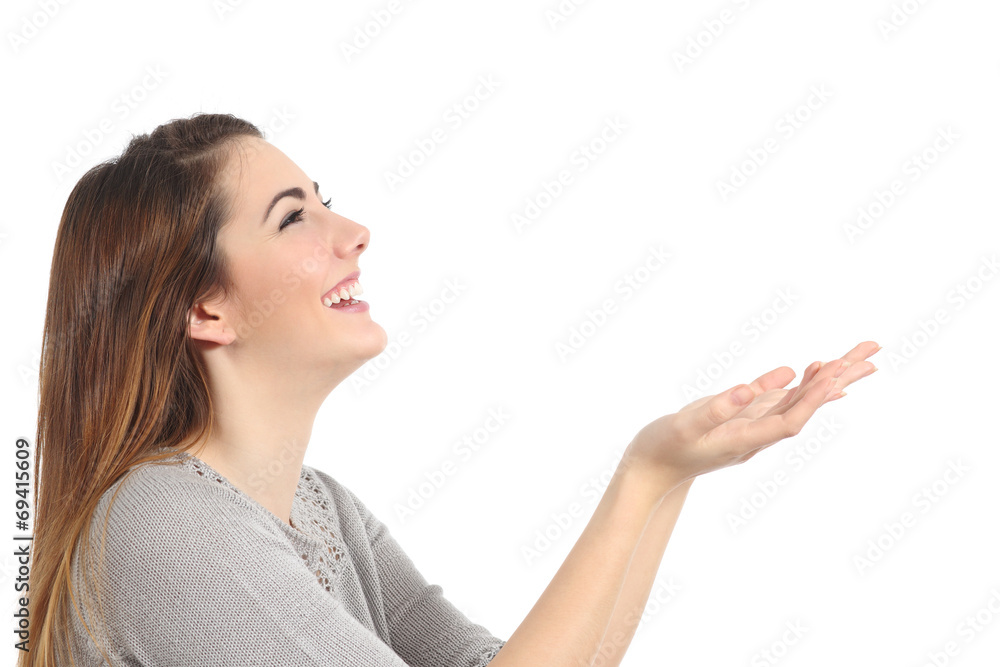 Profile of a happy woman holding something blank Profile of a happy woman holding something blank