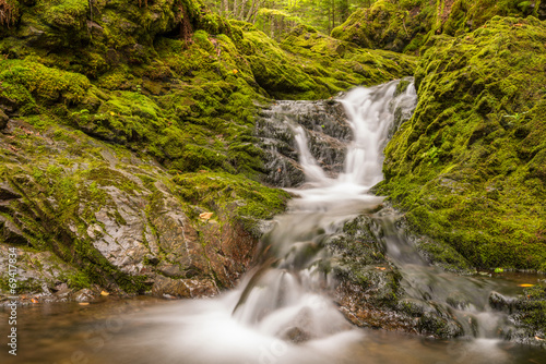 Close-up of small waterfall in the park  Slow shutter speed 