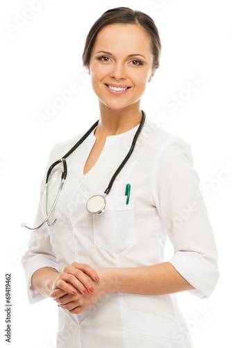 Young positive brunette doctor woman isolated on white