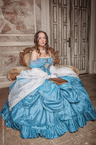 Beautiful woman in blue medieval dress