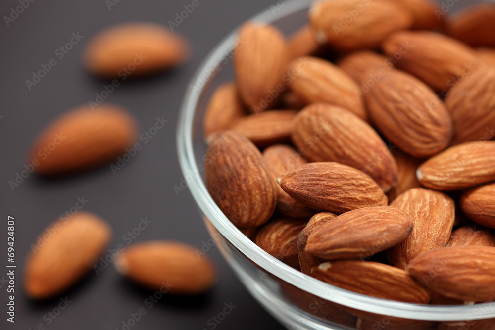 Almonds in a glass bowl Almonds in a glass bowl