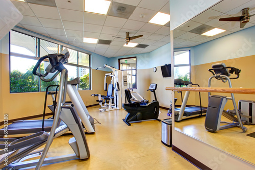Bright gym room in residential building