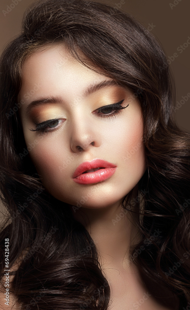 Pure Beauty. Portrait of Young Brunette with Glossy Makeup Pure Beauty. Portrait of Young Brunette with Glossy Makeup