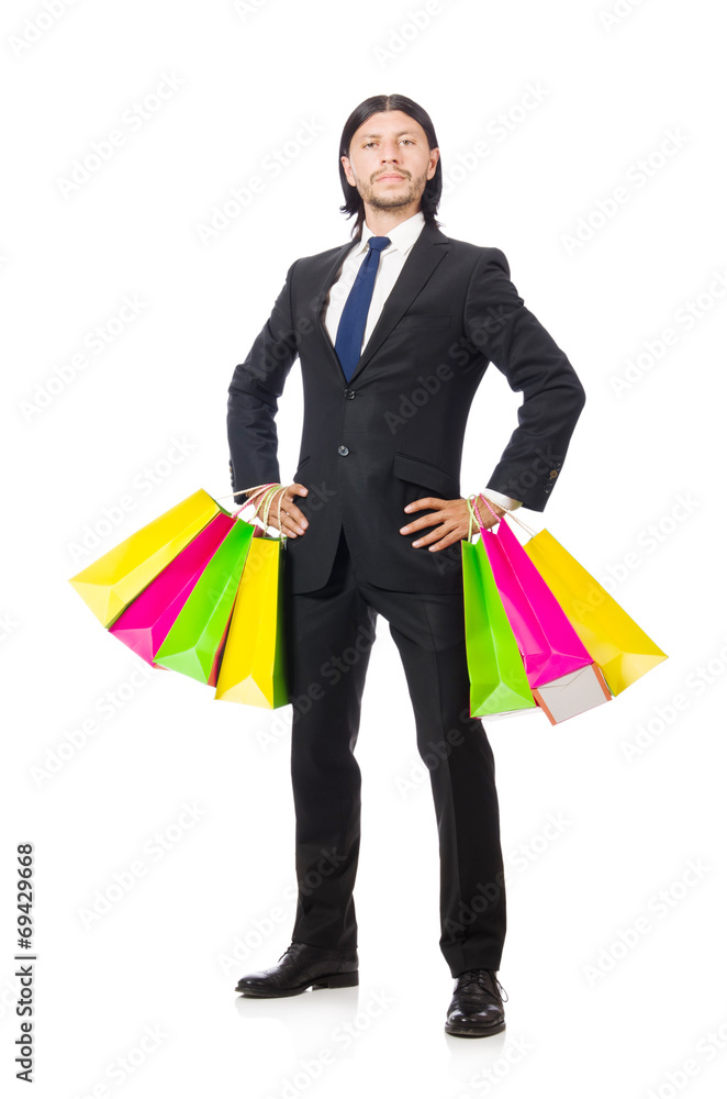 Man with shopping bags isolated on white