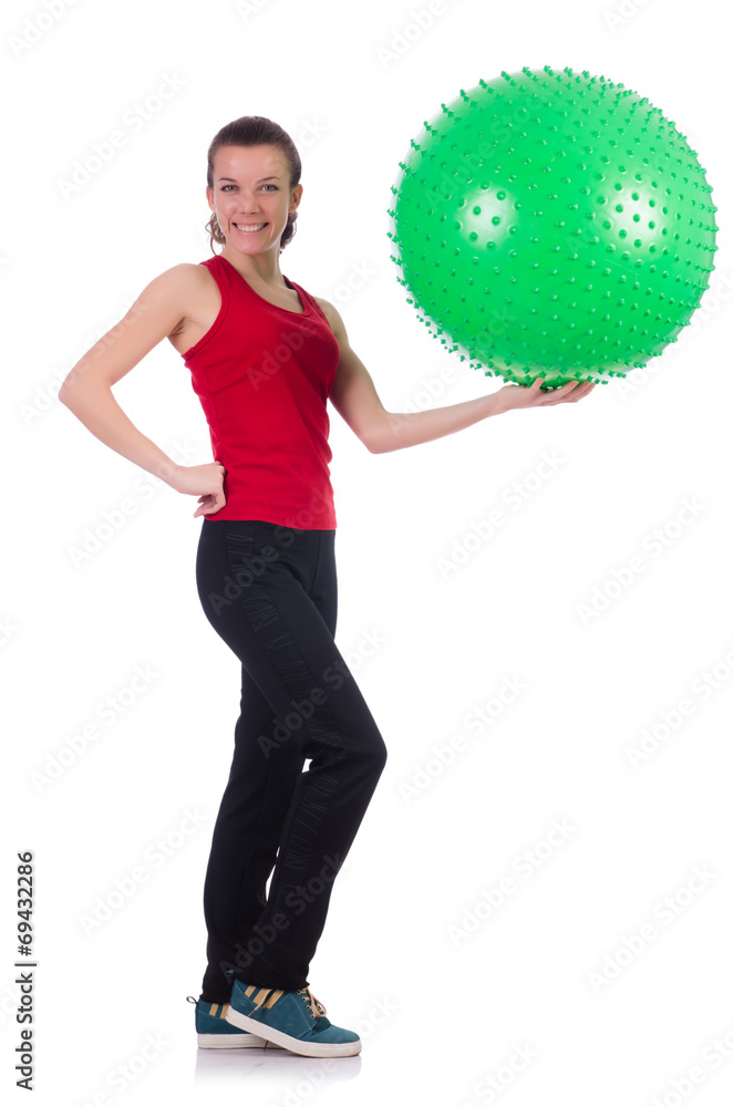 Young woman exercising with swiss ball Young woman exercising with swiss ball