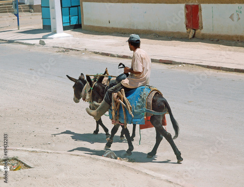 Morocco, two donkey and rider
