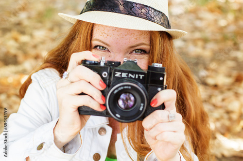 Nice girl photographer at work