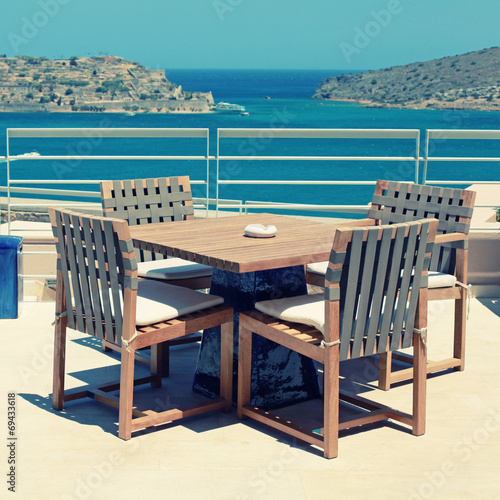 Terrace seaview with outdoor furniture in a luxury resort(Crete, © Inna Felker