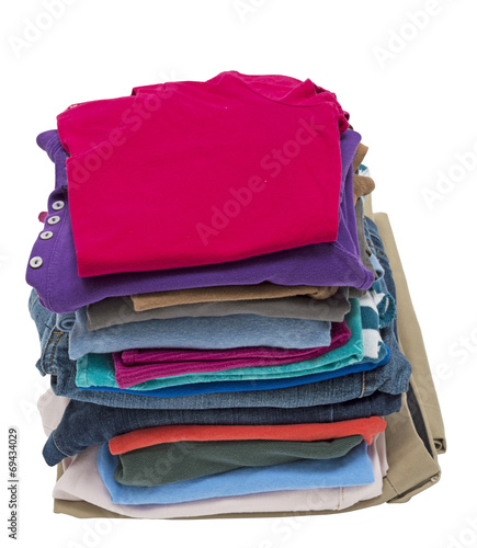 Tall Stack Of Folded Clothing Shot On Angle photo