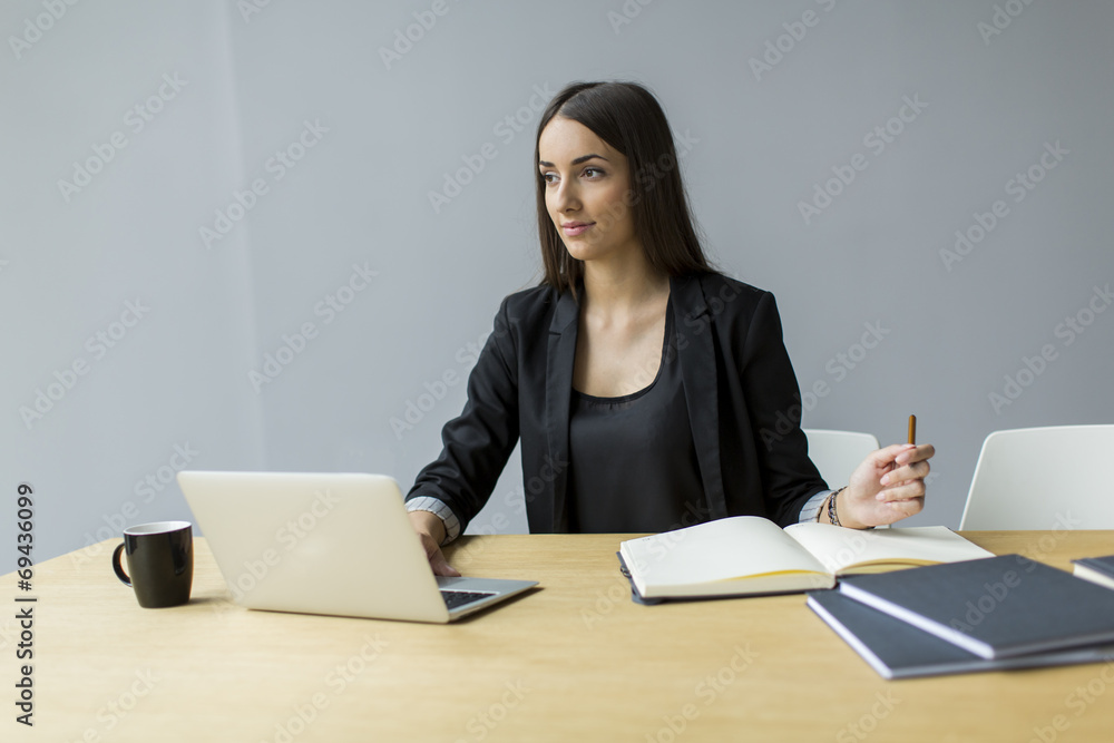 Young woman in the office Young woman in the office