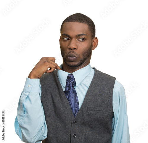 Man in awkward hot situation, blowing air, pulling shirt