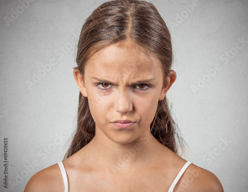 Pissed off. Anger. Headshot of angry teenager
