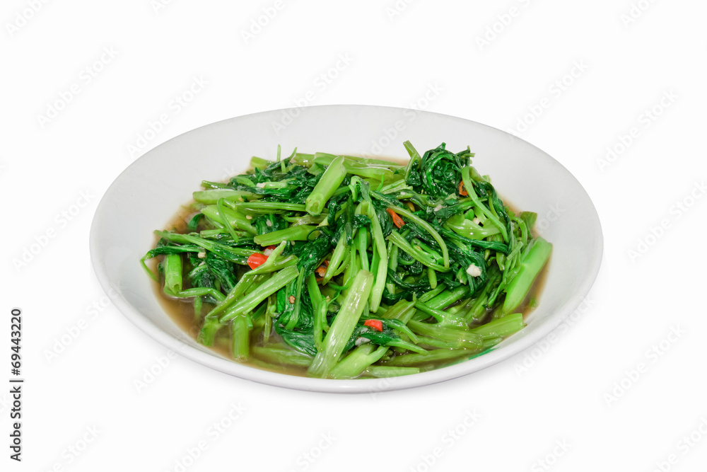 Stir Fried Water Spinach or pak boong fai daeng isolated on whit Stir Fried Water Spinach or pak boong fai daeng isolated on whit