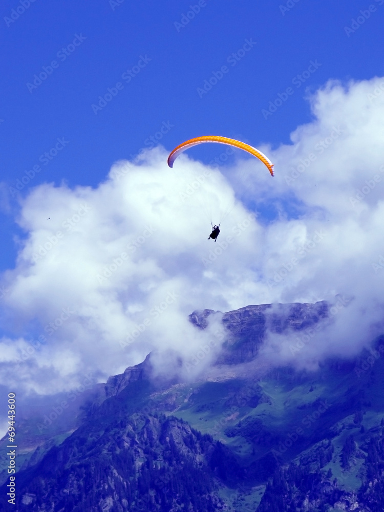 paragliding, parachute over the mountain paragliding, parachute over the mountain