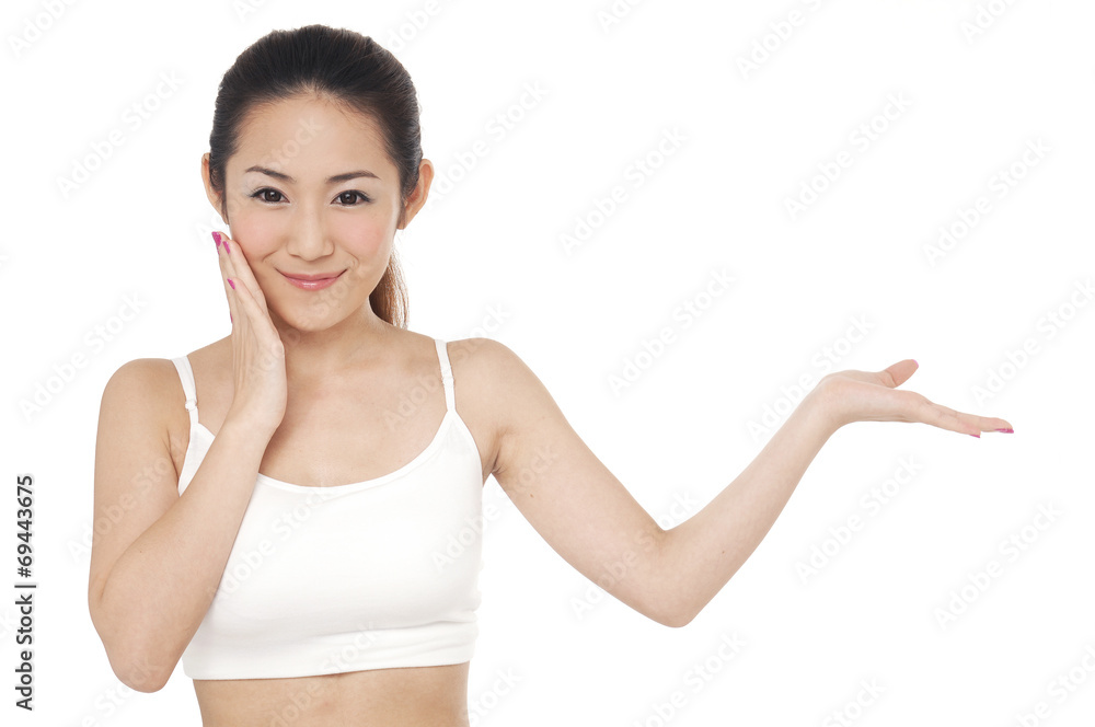 portrait of young woman showing beauty product portrait of young woman showing beauty product
