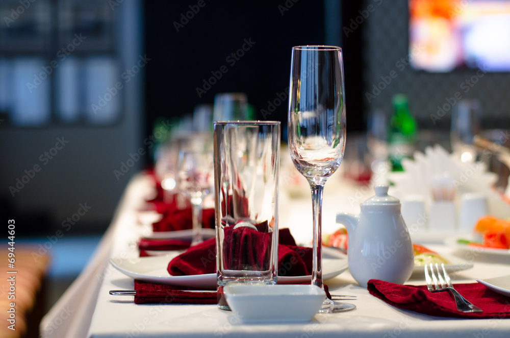 Formal stylish setting on a dinner table Formal stylish setting on a dinner table