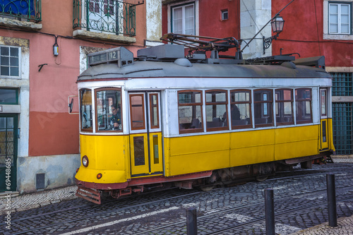 Vintage yellow tram, symbol of Lisbon, Portugal