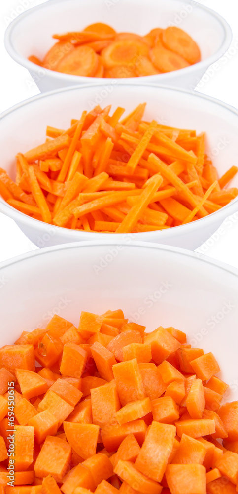 Different style of chopped carrots in white bowls Different style of chopped carrots in white bowls