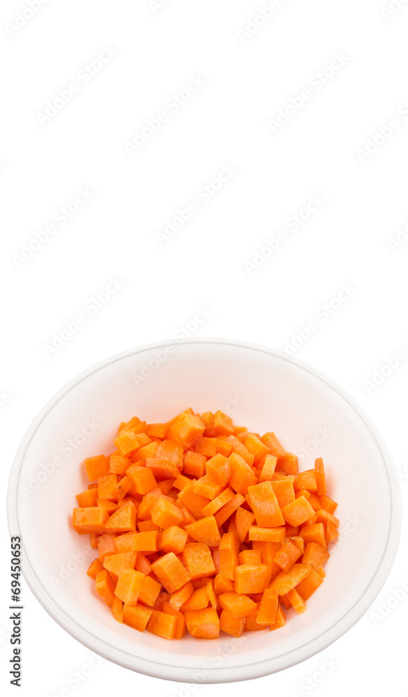 Chopped carrot in a bowl over white background Chopped carrot in a bowl over white background