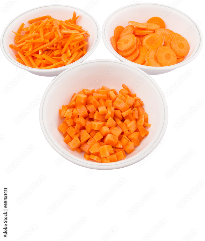 Different style of chopped carrots in white bowls Different style of chopped carrots in white bowls