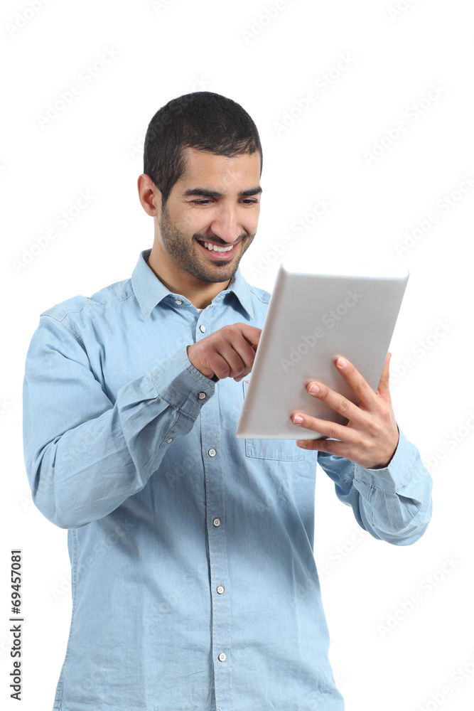 Arab man browsing a tablet reader with finger Arab man browsing a tablet reader with finger