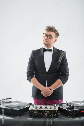 DJ in tuxedo posing