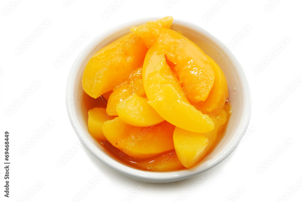 Top View Of Sliced Peaches in a White Bowl Top View Of Sliced Peaches in a White Bowl