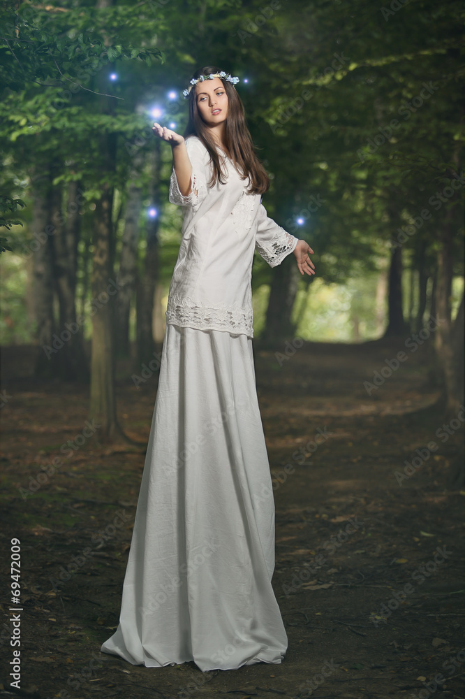 Fairy woman in magical forest Fairy woman in magical forest