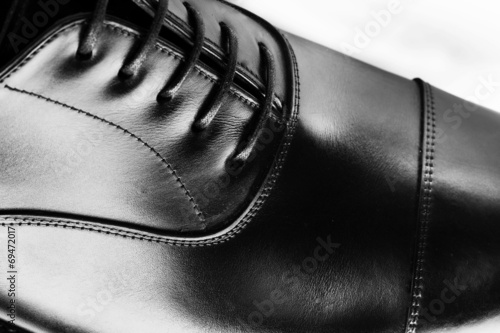 men's leather shoes closeup on white background