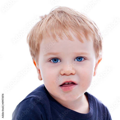 Toddler blond and blue eyes boy child with various facial expres