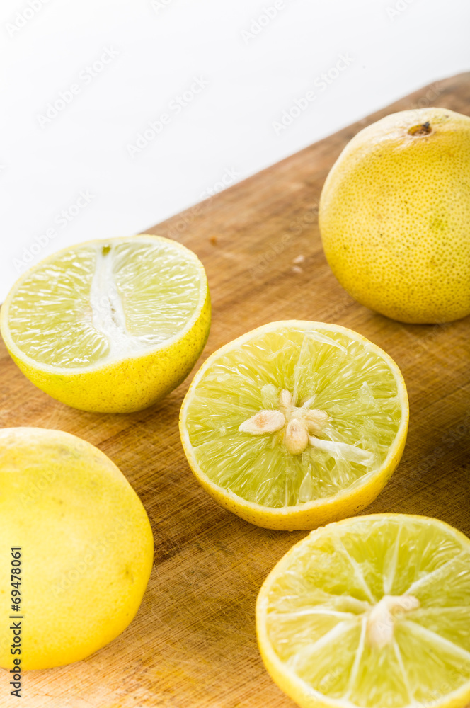 group of lemon isolated on wood group of lemon isolated on wood