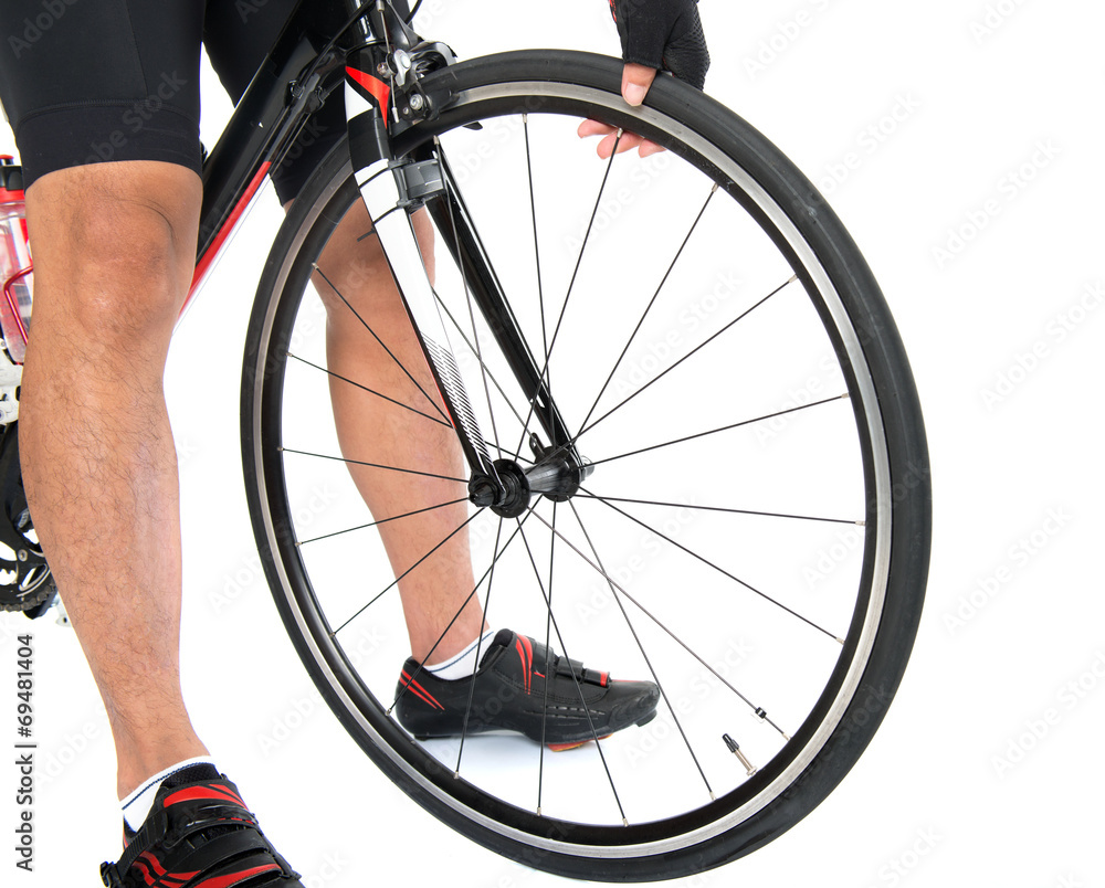 Checking on bike tyre air pressure Stock Photo Adobe Stock