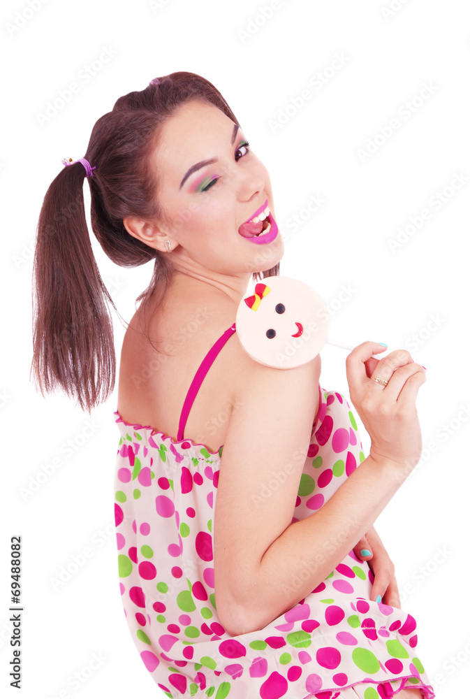 Portrait of laughing girl holding big lollipop Portrait of laughing girl holding big lollipop