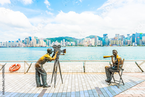 Photography HONG KONG, CHINA - August 14: Statue and skyline in Avenue of St
