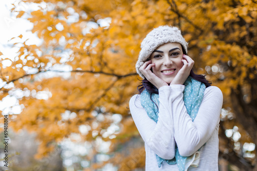 Young woman at autumn forest