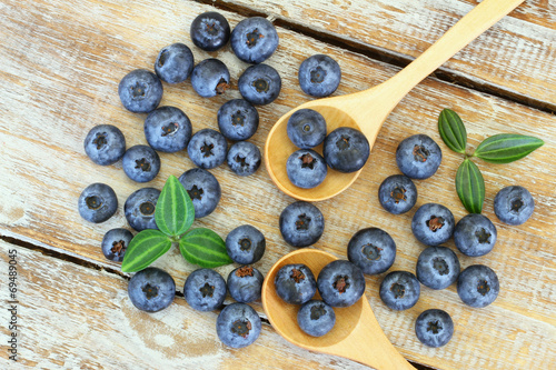 Blueberries on wooden surface
