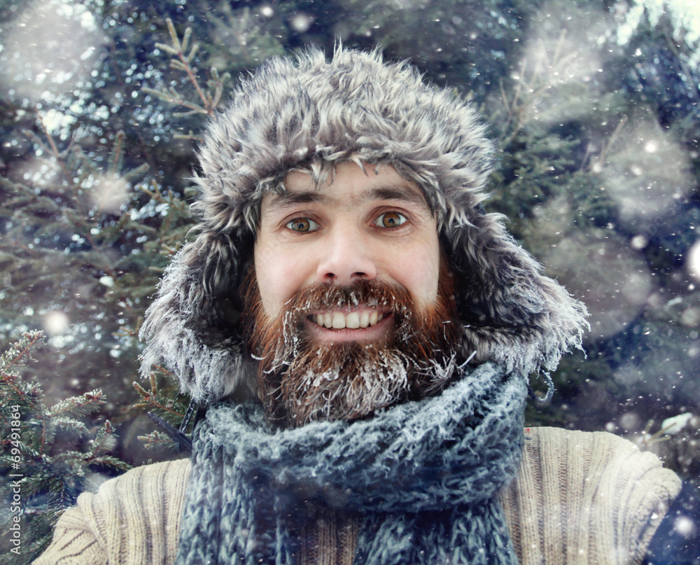bearded man in winter hat smiling portrait extreme bearded man in winter hat smiling portrait extreme