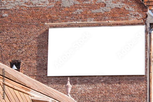 blank billboard on a brick building