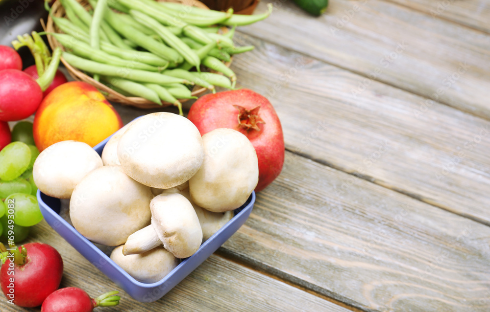Fresh organic vegetables and fruits on wooden background Fresh organic vegetables and fruits on wooden background