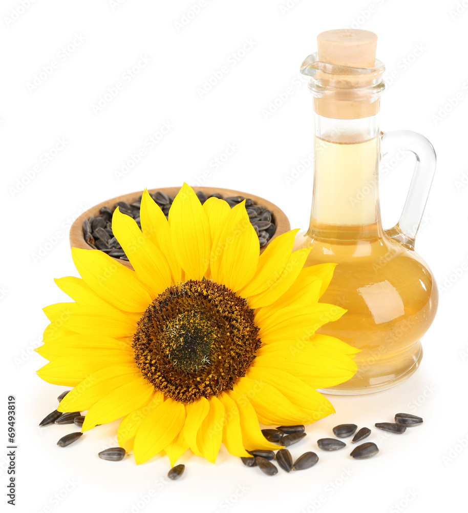 Sunflower with seeds and oil isolated on white Sunflower with seeds and oil isolated on white